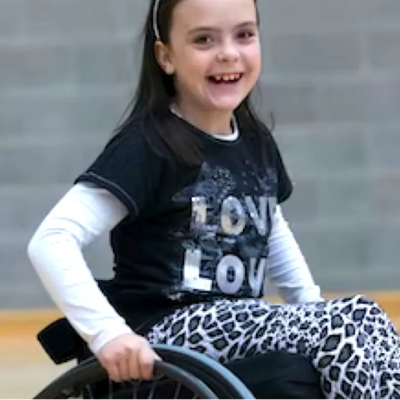 Young girl in a wheelchair