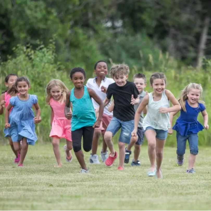 Kids running in field