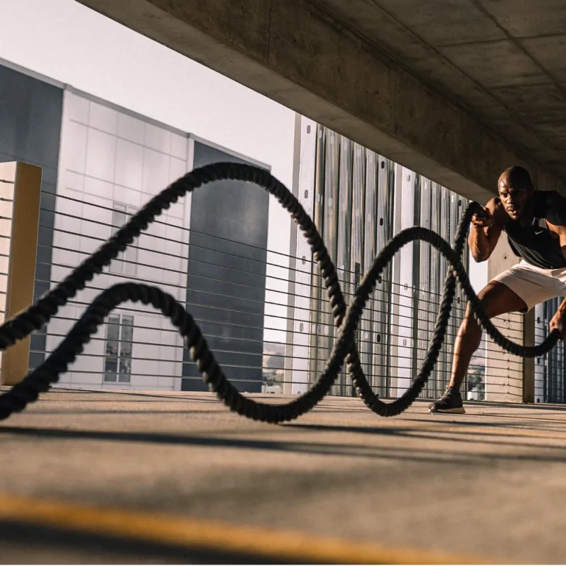 Man doing battle ropes