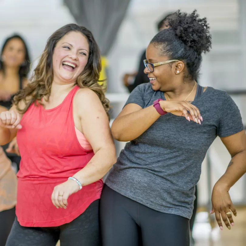 Women dancing in a group exercise class