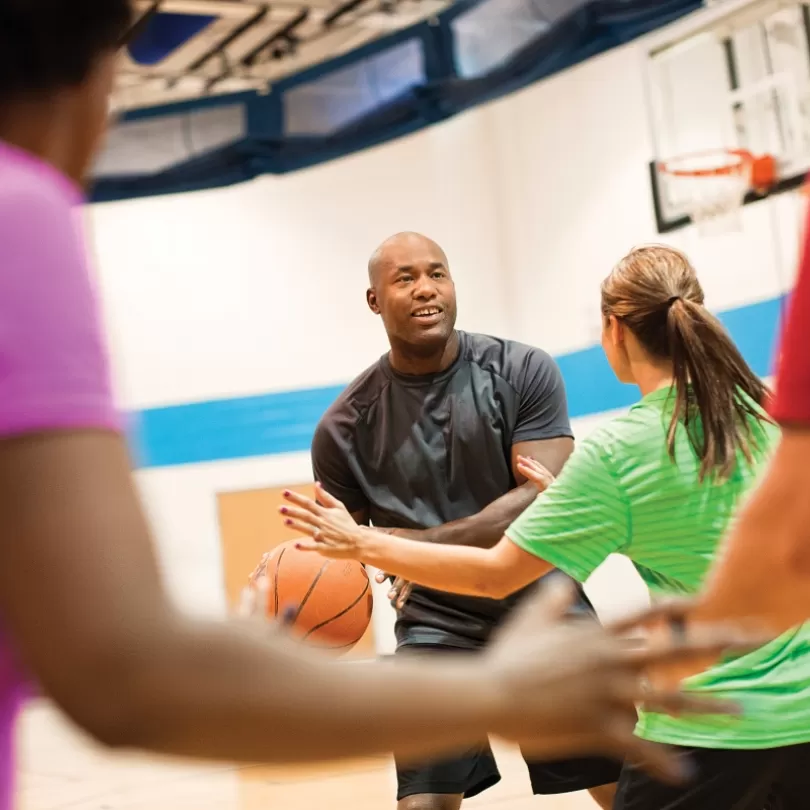 members playing basketball