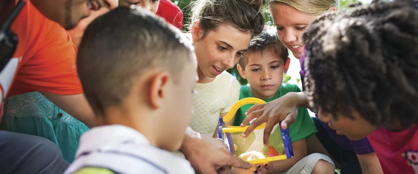 CILT counselor playing a game at summer day camp