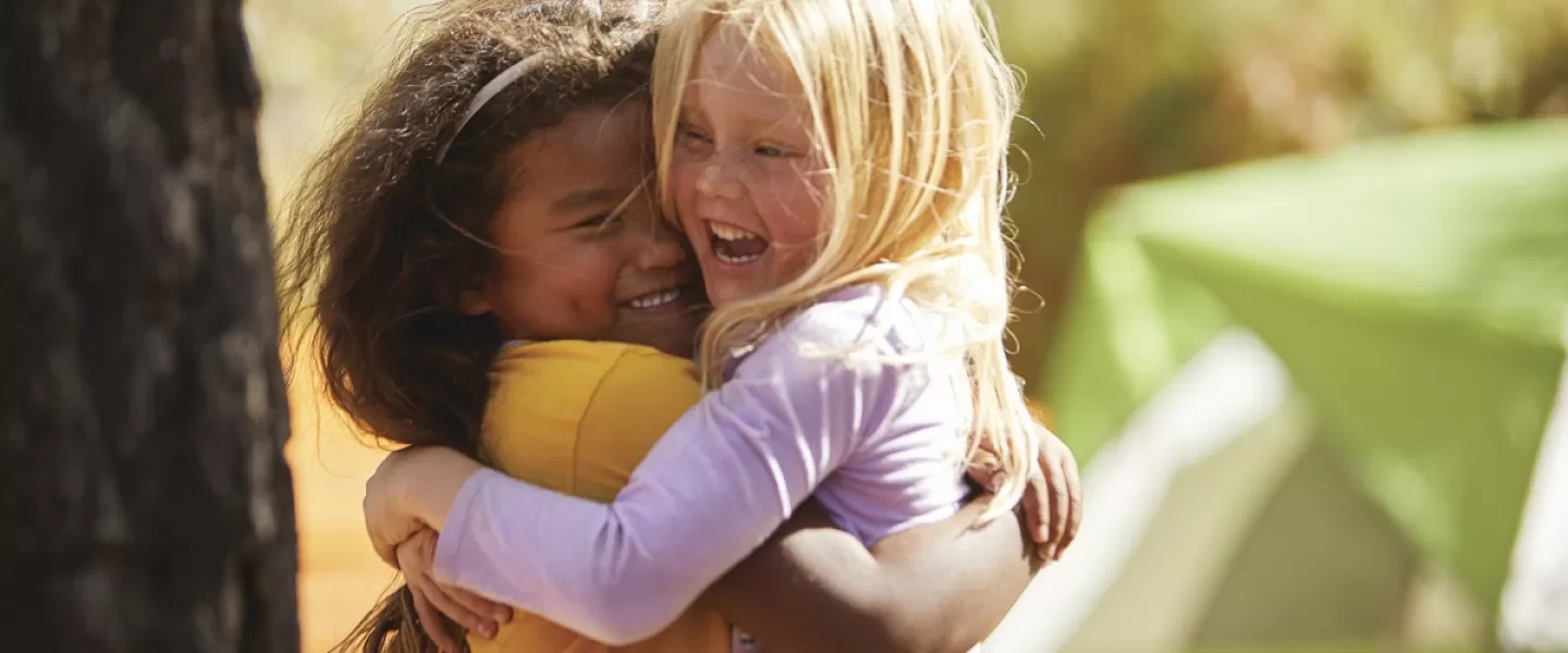 YMCA kids hugging