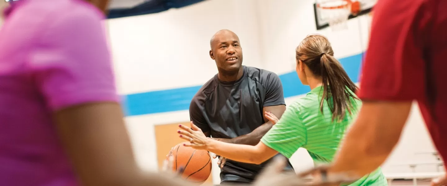 members playing basketball