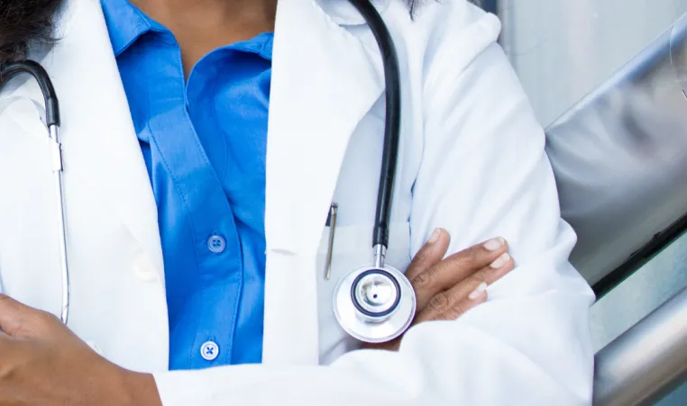 An abstract close up picture of a female doctor.